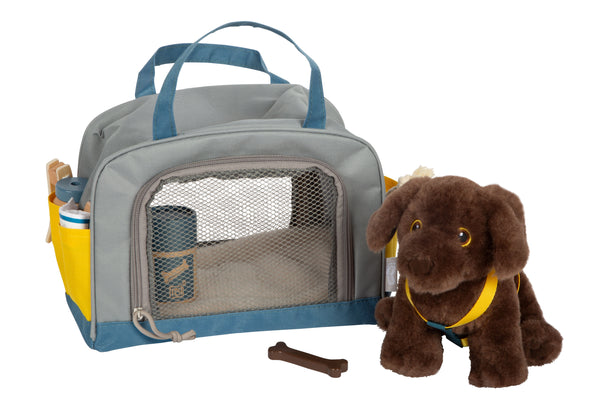 Labrador-Hund mit Tasche und Pflege-Set