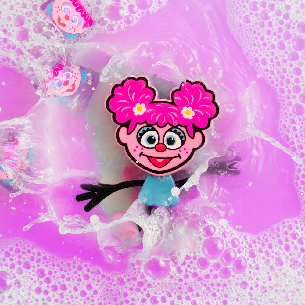 Badefigur Abby – Set mit zwei Sensorik-Würfeln, die im Wasser leuchten