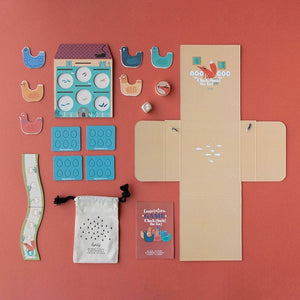 Familienspiel in Taschenversion Cluck, cluck! Fox! – Puk Puk, hier ist der Fuchs!