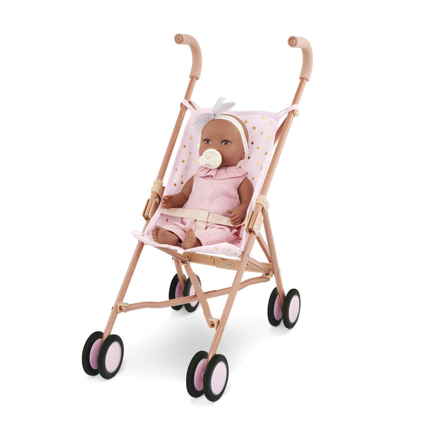 Babypuppe mit Schnuller im rosa Musselinoutfit mit Stirnband