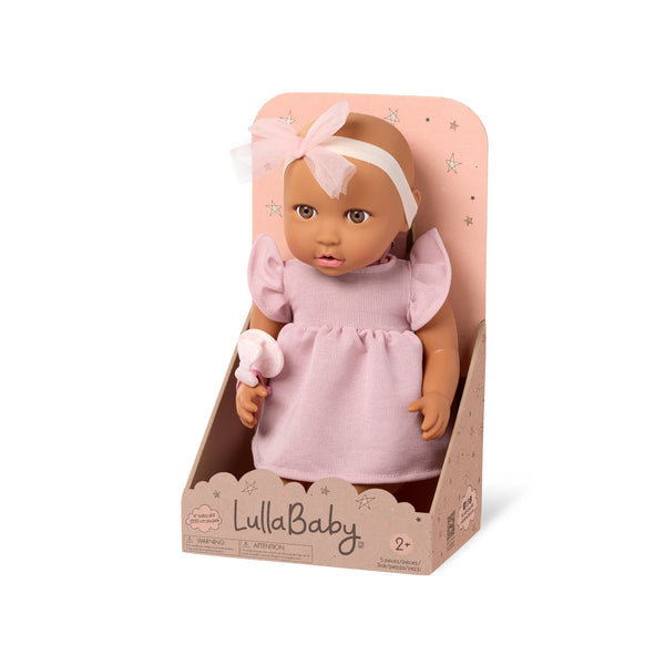 Babypuppe mit Schnuller im Kleid mit Stirnband