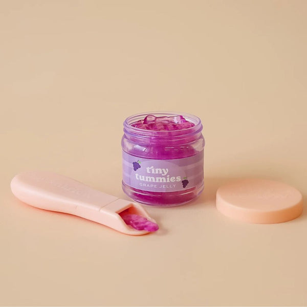 Magisches Glas Tiny Tummies mit Löffel zum Füttern von Puppen – Traube