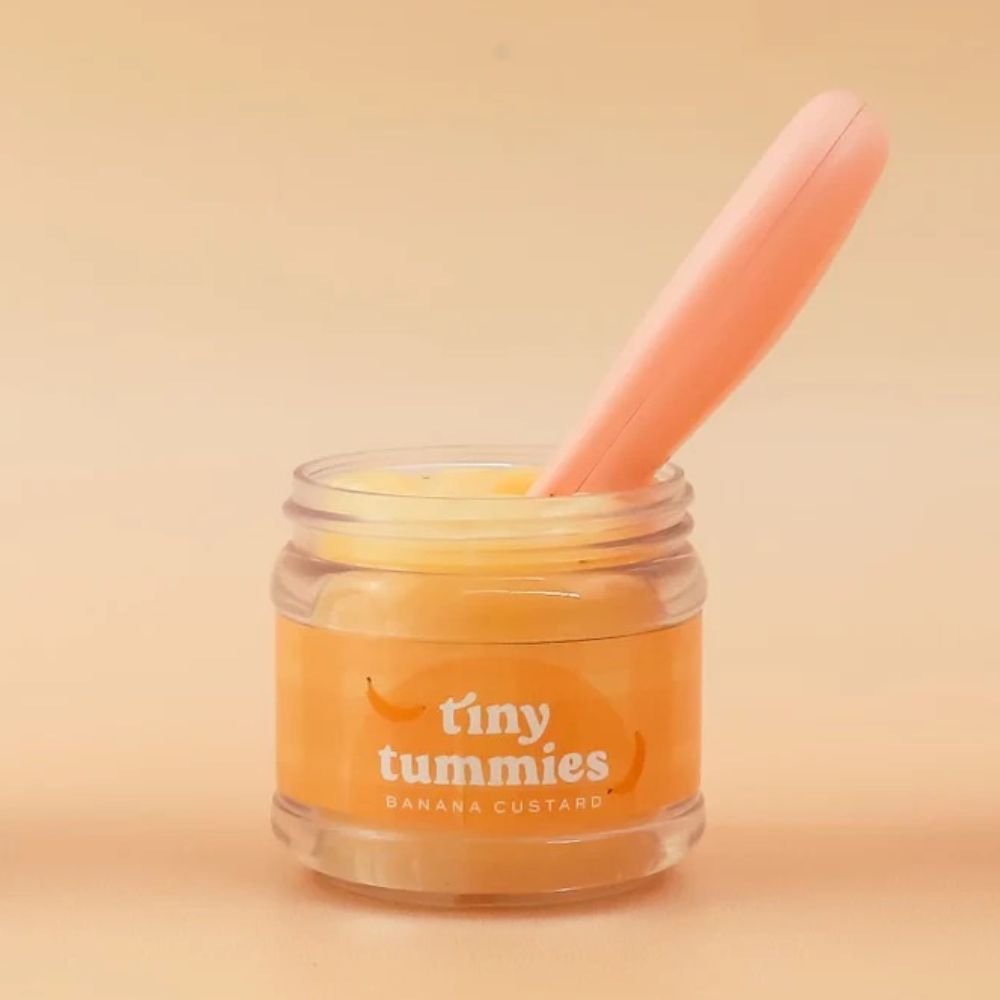 Magisches Glas von Tiny Tummies mit Löffel zum Füttern von Puppen  - Banane