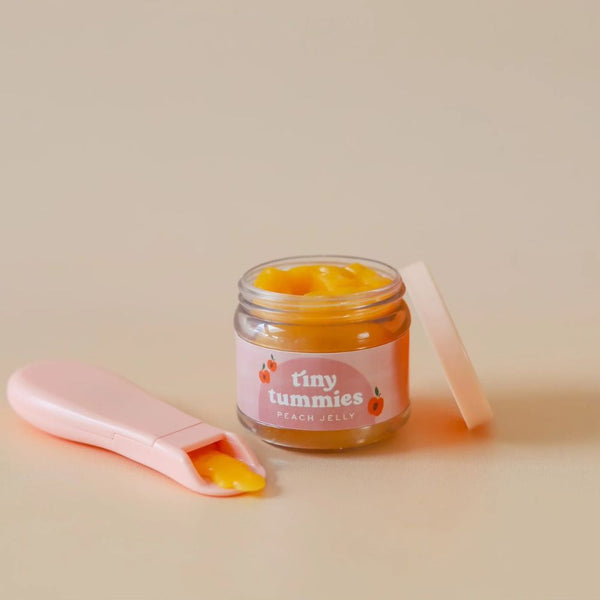 Magisches Glas Tiny Tummies mit Löffel zum Füttern von Puppen – Pfirsich