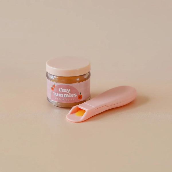 Magisches Glas Tiny Tummies mit Löffel zum Füttern von Puppen – Pfirsich