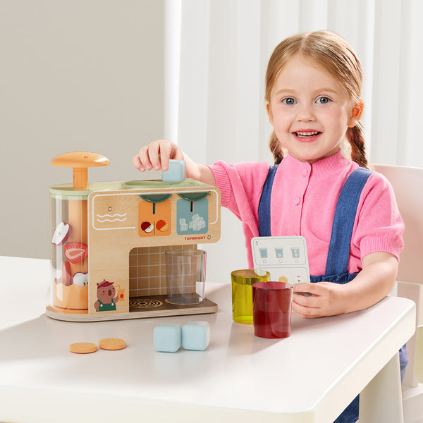 Interaktive Saftpresse aus Holz