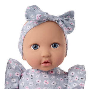 Babypuppe mit Kleid und Stirnband mit Strampler und Trinklernbecher