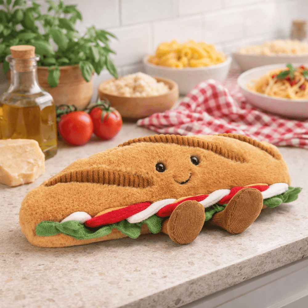 Jellycat Plüsch Baguette Caprese mit lächelndem Gesicht und bunten Details für Kinder