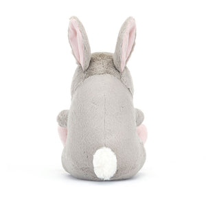 Jellycat Plüschhase 16 cm in Grau mit rosa Ohren und weißem Schwanz sitzend von hinten