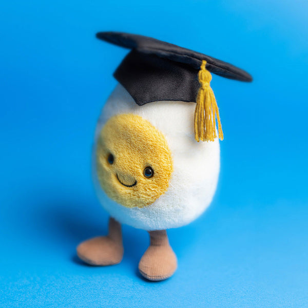 Jellycat Plüsch-Ei – Absolvent 14 cm mit schwarzer Doktorhutmütze und freundlichem Gesicht