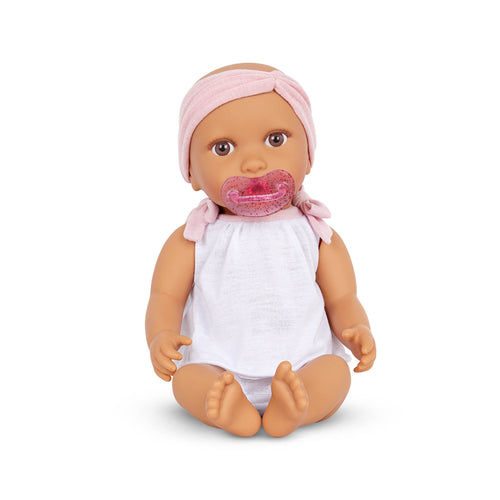 Babypuppe mit Schnuller im zweiteiligen Outfit mit Stirnband