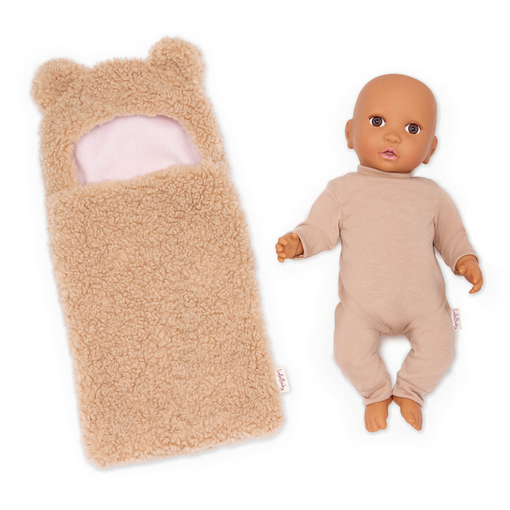 Babypuppe mit Teddyschlafsack im Pyjama
