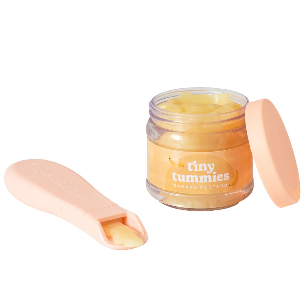 Magisches Glas von Tiny Tummies mit Löffel zum Füttern von Puppen  - Banane